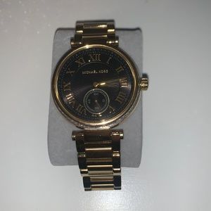 Black and gold Michael kors watch